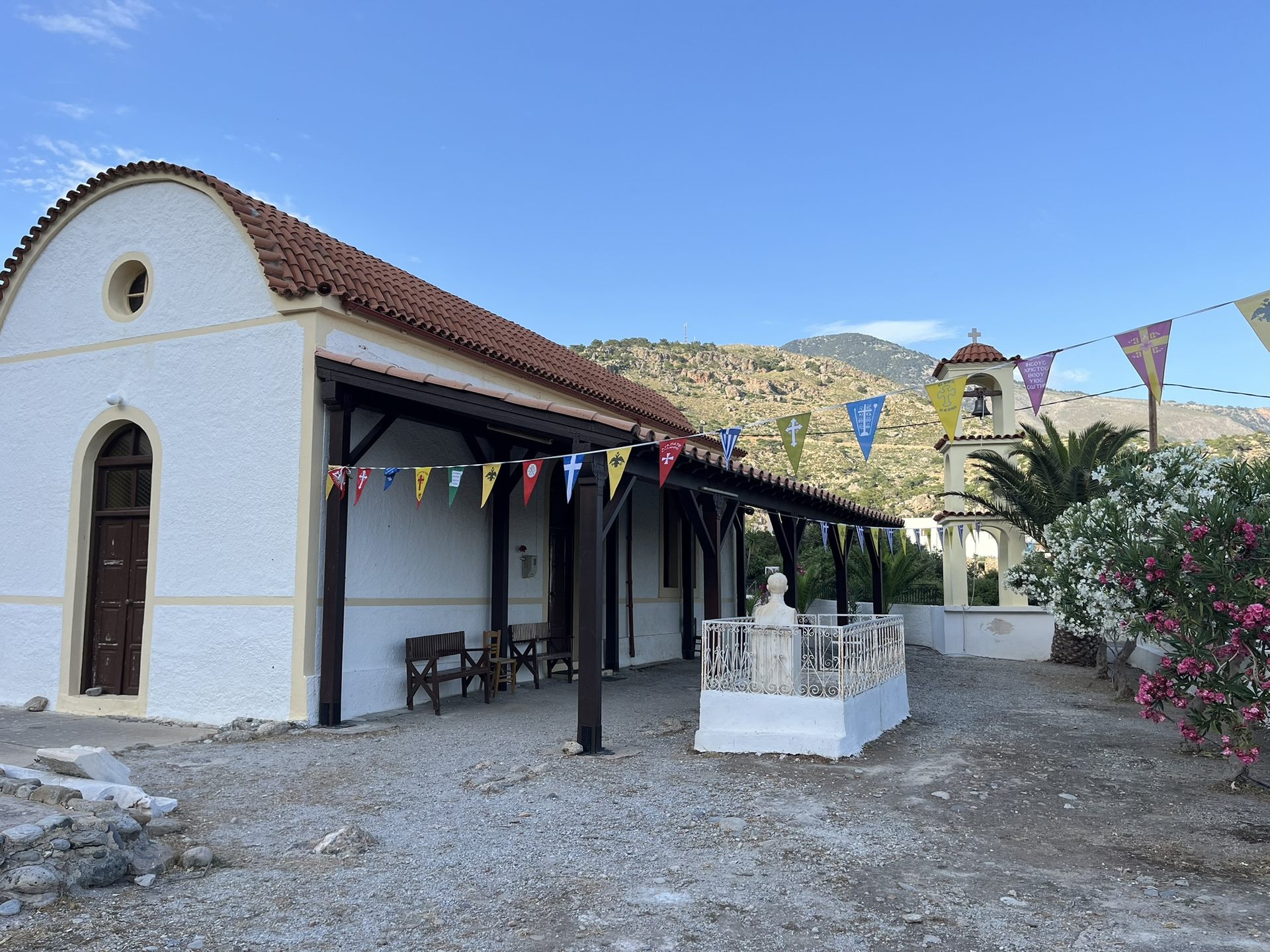 Village church with festival flags