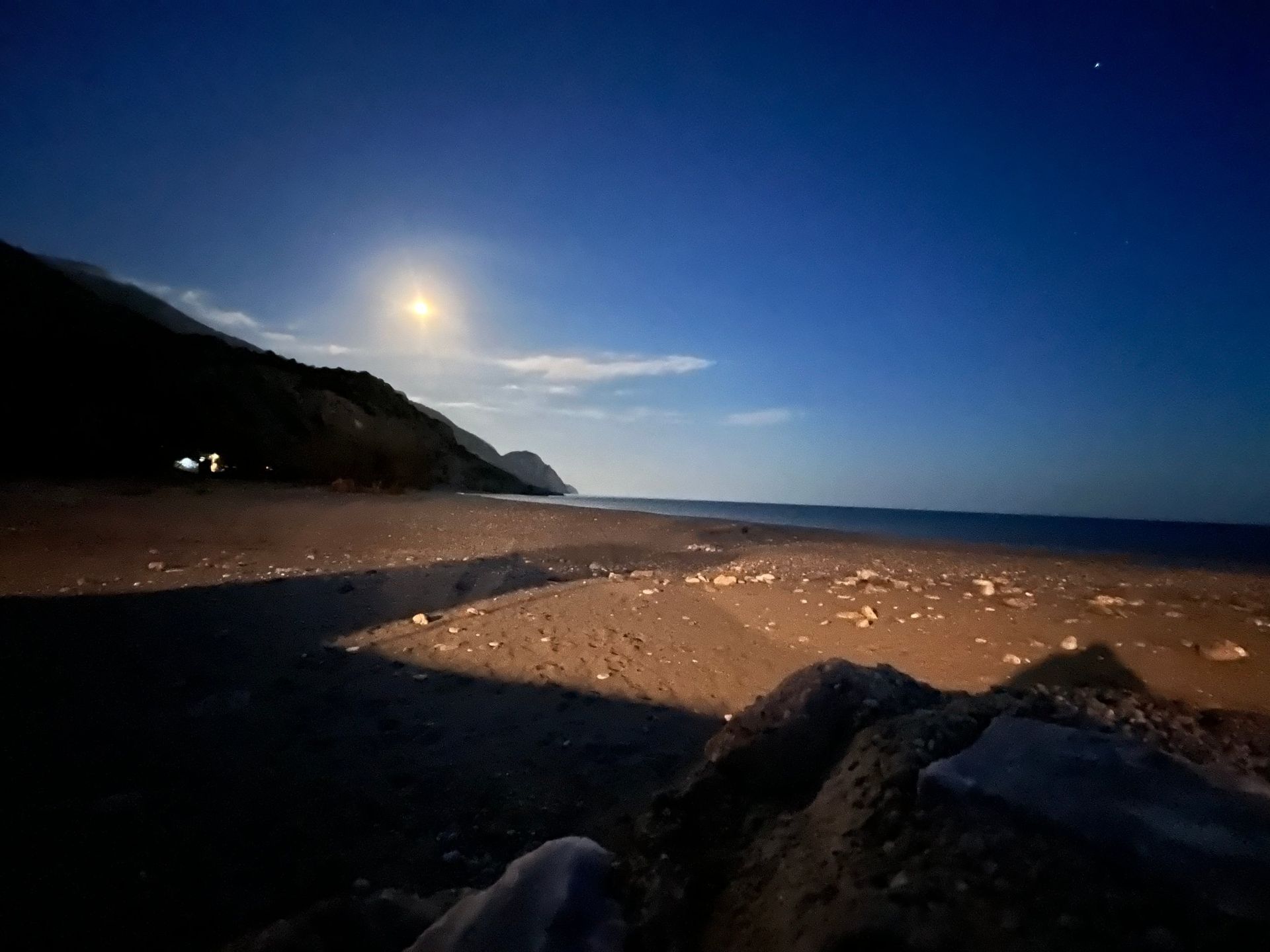 The moon over Sougia beach at night