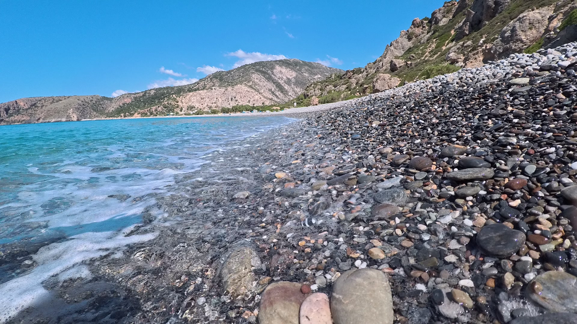 Small waves over the pebbles of Sougia