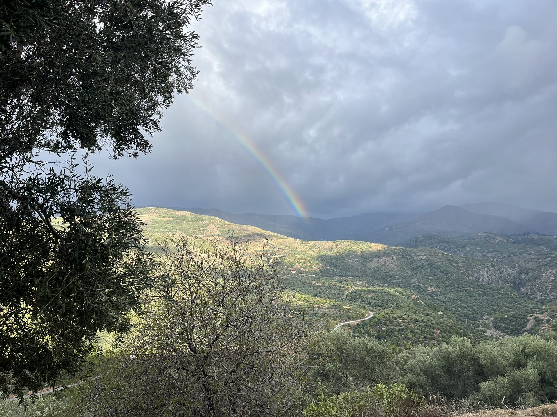 A rainbow over the valley after the rain